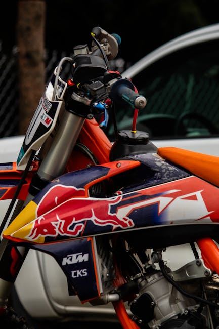 Close-up of a colorful motocross bike highlighting design and power.